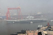 中国海军航母首次海试完成返回码头 海军“88”舰也