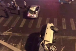 路虎冲下国贸桥 起亚被砸中