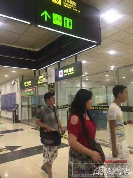 滞留的中国游客回到重庆