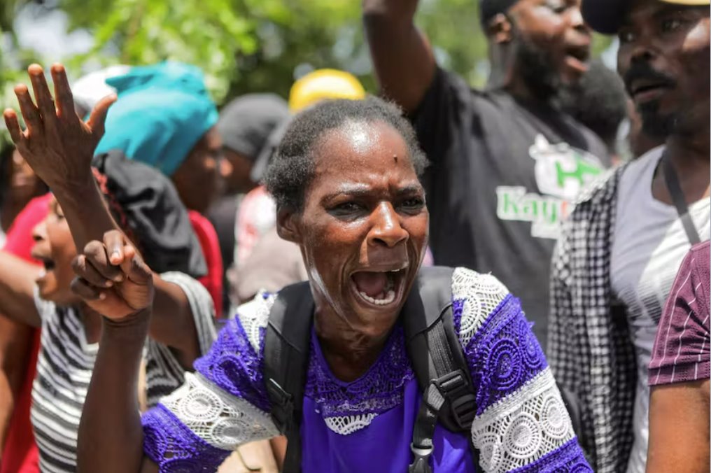 海地援助组织因数千人逃离帮派战争而停止行动